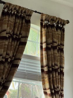 Sofa and  love seat and curtains