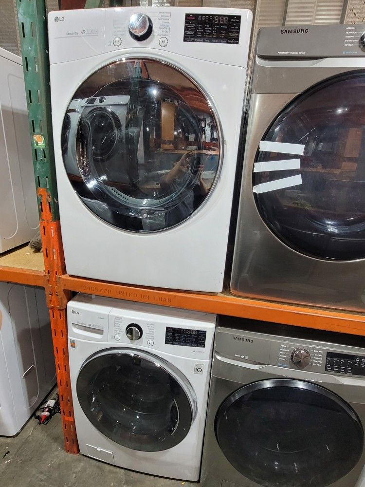 New LG Front Load Washer And Stackable Gas Dryer Set