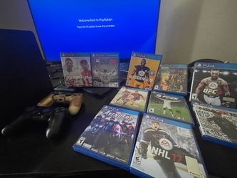 ps4 slim 1tb with 2 controllers and 10 games
