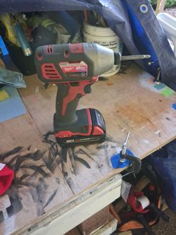 Milwaukee impact drill with battery