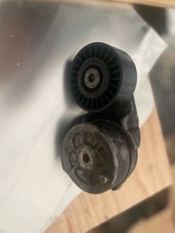 Cummins belt tensioner
