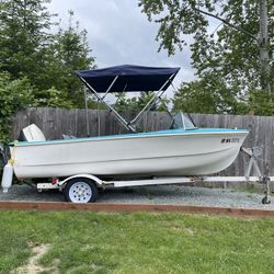 1972 14’ft SeaSwirl W/50HP Johnson Motor & Trailer