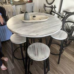 High Top Table With. 4 Stools 