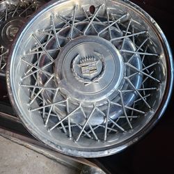Hubcaps for a 77 Cadillac seville
