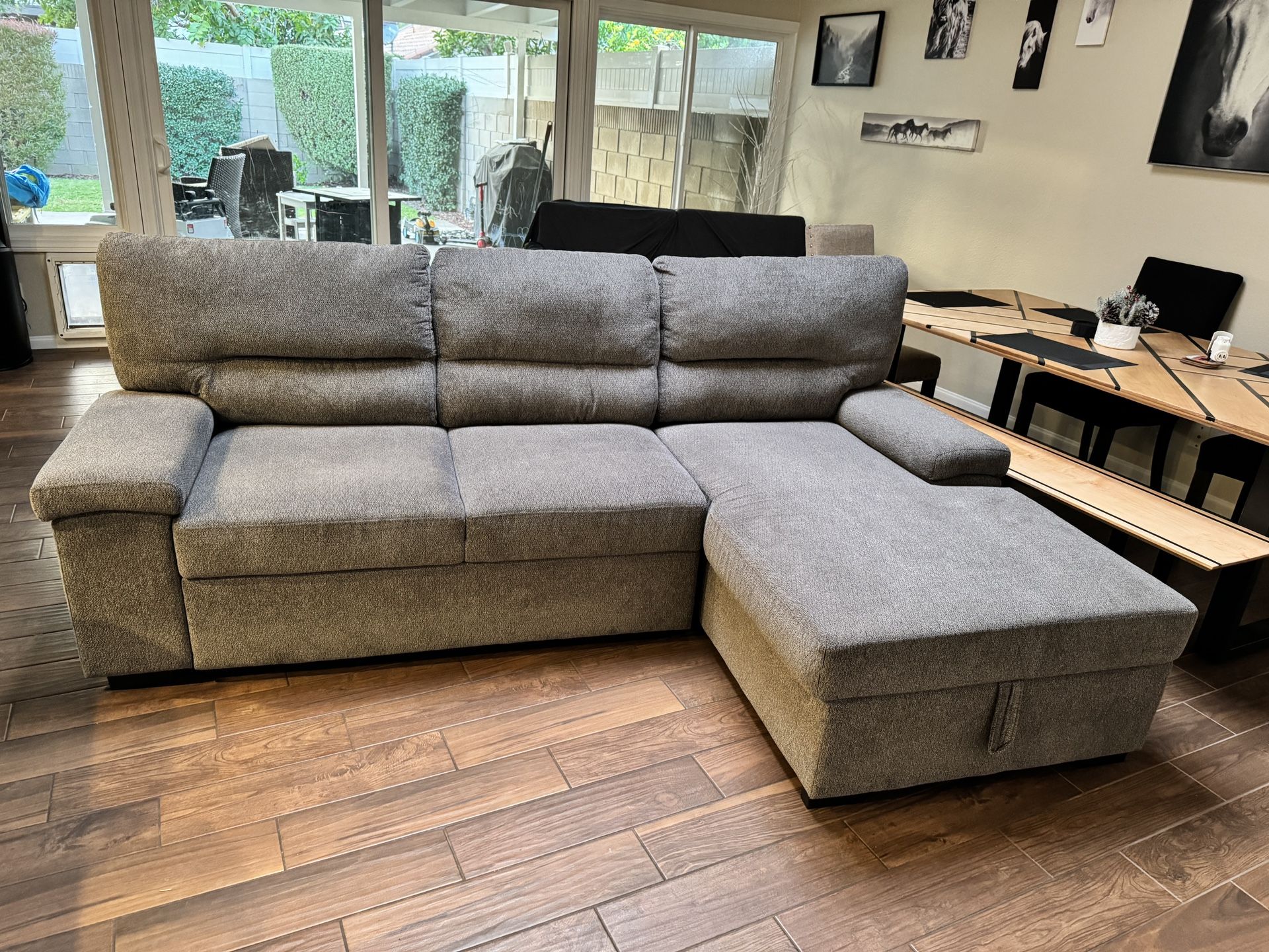 Grey Ashley Furniture Couch With Popup Bed And Chaise With Storage