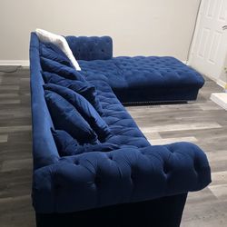 Blue velvet sofa