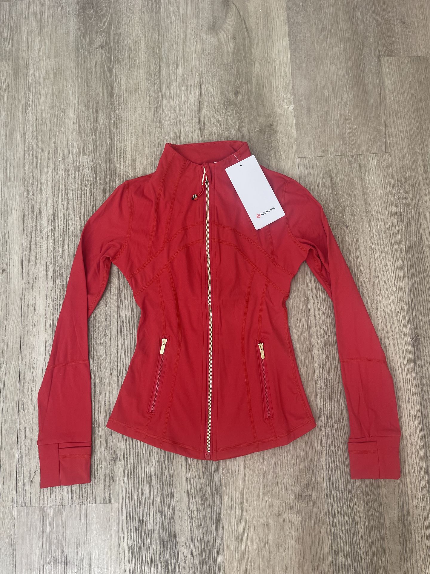 Lululemon red define jacket with gold zipper