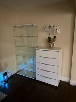 White Chest And Glass Container