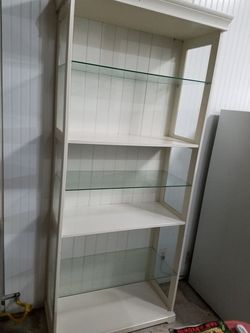 Tall Ikea cabinet with glass