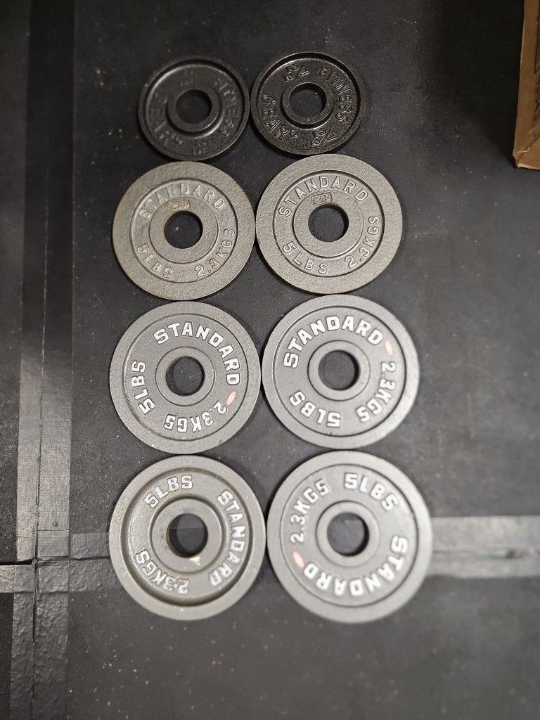 Good Condition 2.5lb And 5lb Olympic Weight Plates --