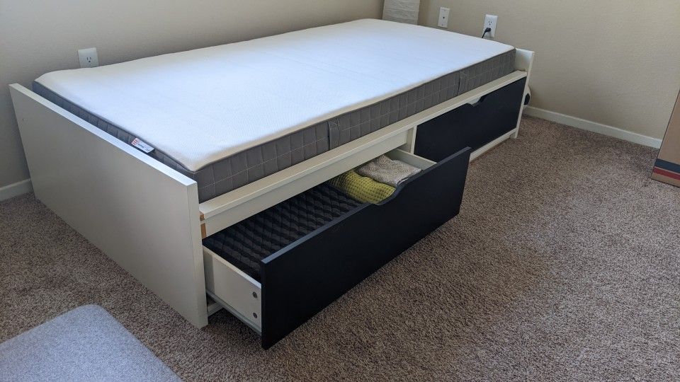 Ikea Flaxa twin bed frame with 2 storage boxes and mattress