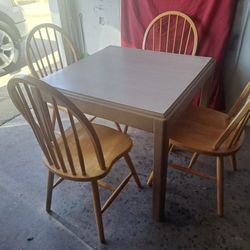 SMALL TABLE AND FOUR CHAIRS.  
