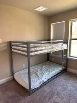 Twin over Twin bunk bed with mattress and mattress cover