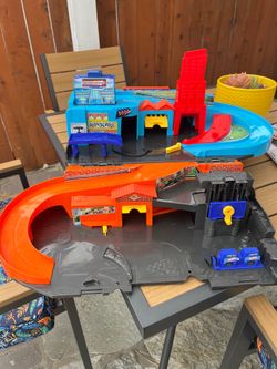 Hotwheels sets  2 sets and 1 car eater