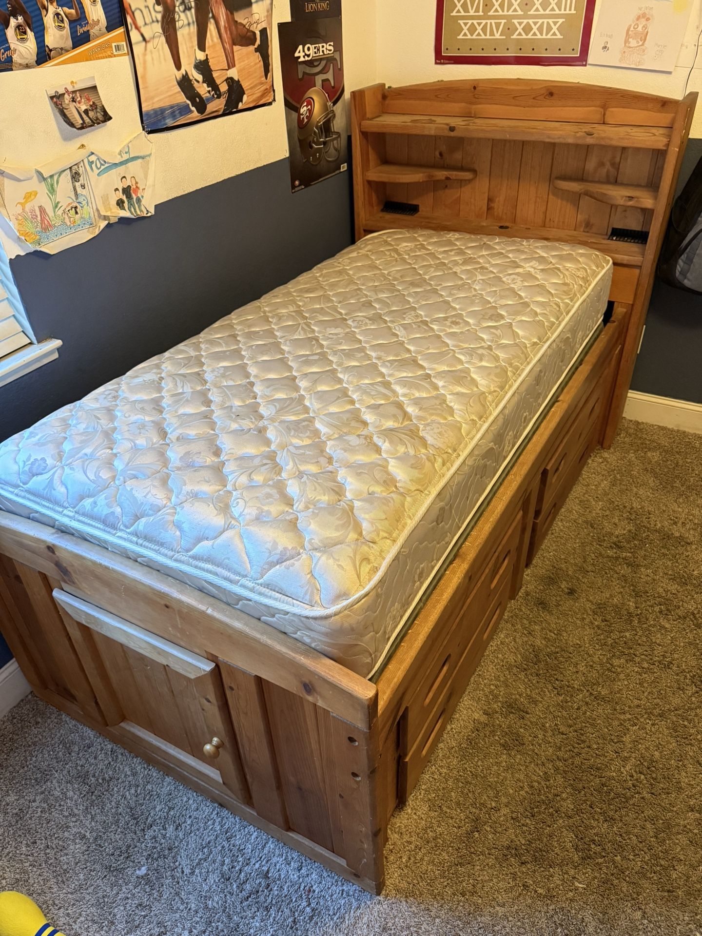 Twin bed with four drawers and secret compartment in the back