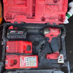 MILWAUKEE DRILL WITH BATTERY AND CHARGER 
