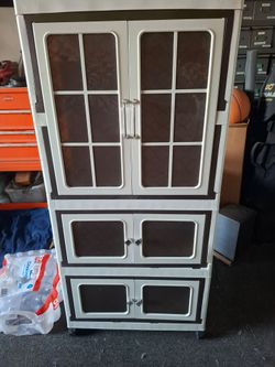 Tall Storage Cabinet with Doors on Wheels