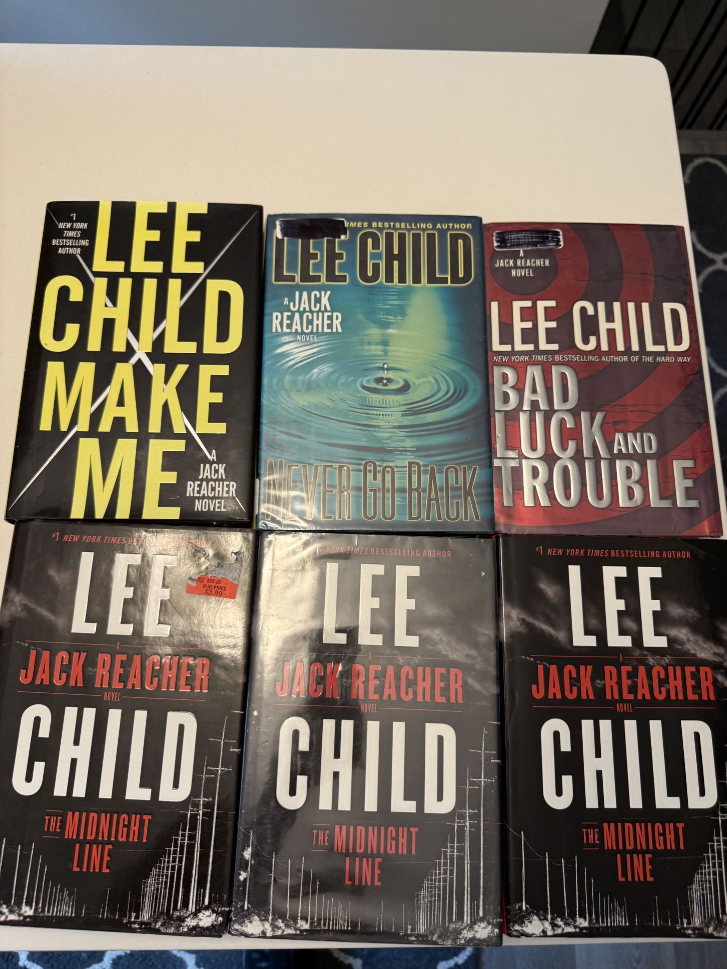 Book Sale. James Patterson, Lee Child, Tom Clancy. $2 A Piece. All Good Condition