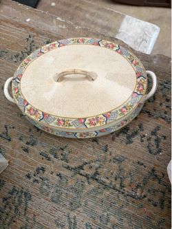 Vintage porcelain dish with a lid