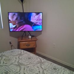 two flat screens 35 in and 51 inch