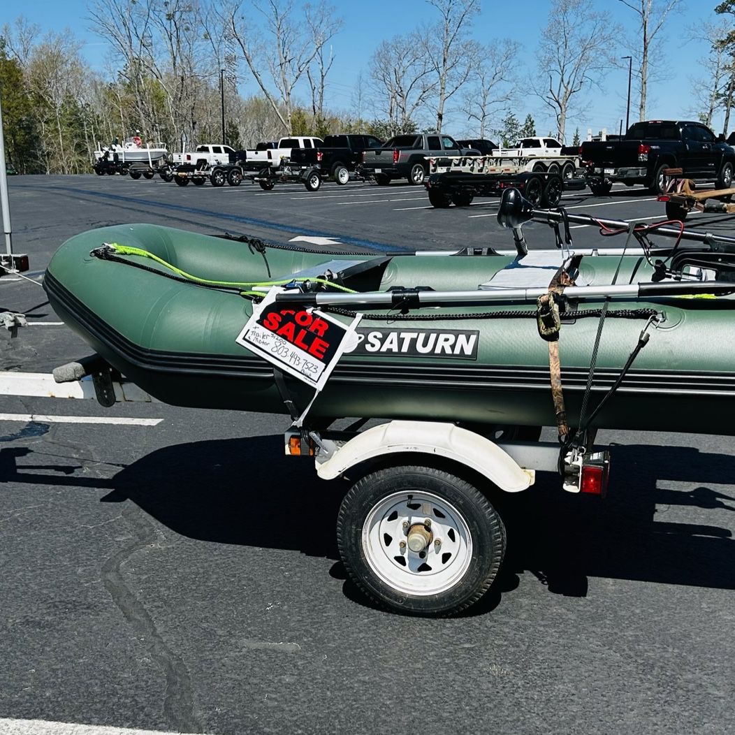 Inflatable Boat, Motor +trailer  $700