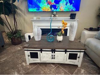 Beautiful white farmhouse coffee table with sliding barn doors on each side