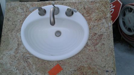 Kholer faucet and Vanity sink