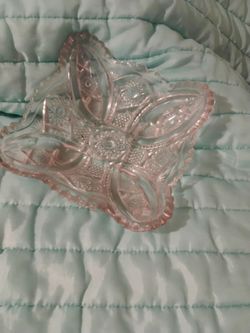 A bowl that looks like a shaved in a butterfly it's a glass straight