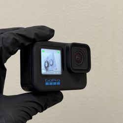 GoPro - HERO10 Black Action Camera - Black - Plus Two Batteries, Dual Battery Charger, Floating Hand Grip, Camera Case, And Performance Chest Mount 