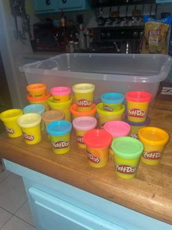 Lot of fresh play dough with play tools