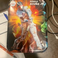 This is a Ronald Acuña Jr. baseball trading card collection tin