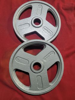 2" HOLE OLYMPIC PLATES  70LBs TOTAL.  2-35s
