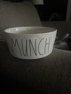 Dog bowl has the words munch meaning food for the dogs?