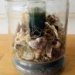Glass Aquarium w/Natural Shells, Candle, Sand, Foliage. 7 1/2” DiameterX9 1/2” Tall.