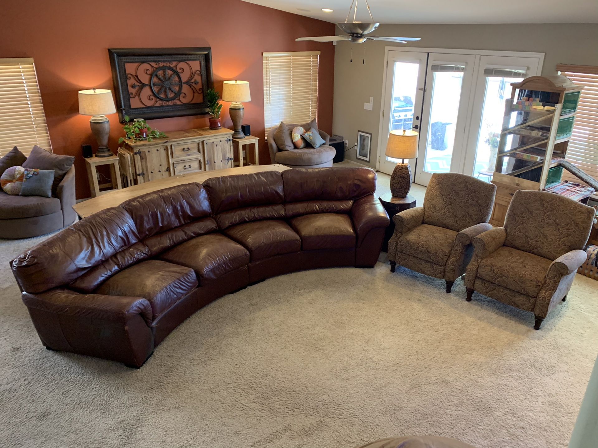 Circular 1/2 moon shaped burgundy brown leather curved couch, sofa, sectional.