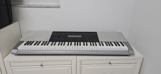 Casio WK-220 Electronic Keyboard – 76 Touch-Response Keys + Stand & Music Rest