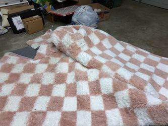 Pink and white rug