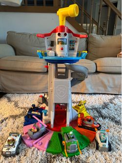 Paw patrol tower with9 vehicles 9 figures