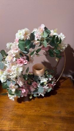 12” gold metal hoop with decorated artificial flowers and batteries operated candle for decoration or centerpieces, $35