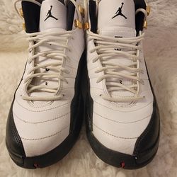 Authentic Pair of Nike Air Jordan 12 Retro "Taxi" sneakers. 2013  (153265-125) Women's Size 6.5