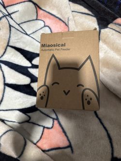 Miaosical pet feeder