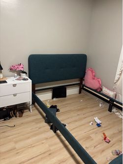 Full size upholstered bed frame all parts and screws. Are there also slats come with it no boxspring needed just mattress.