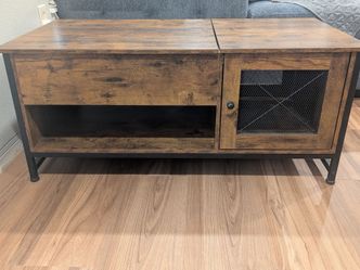 Coffee table with lift top
