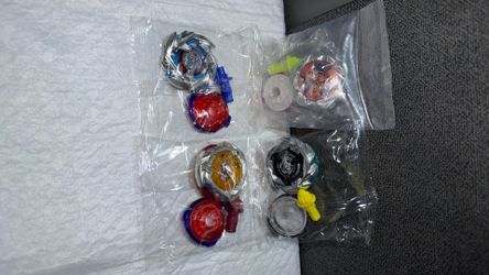 Beyblade bundle of 4 brand new
