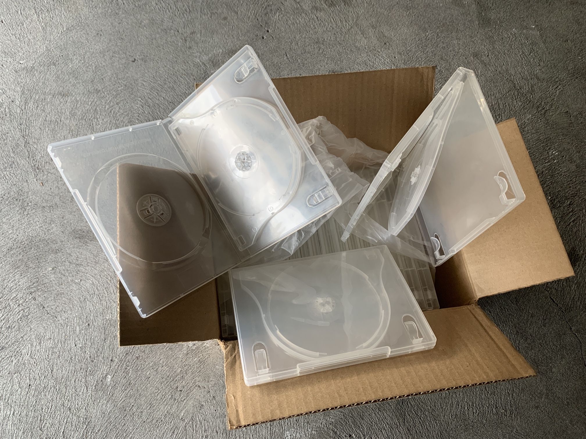 Triple slots of 20 Blu-ray DVD CD Clear case