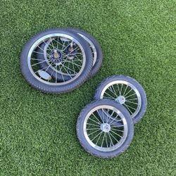 Set Of Wheels And Tires For A Double Jogging Stroller 