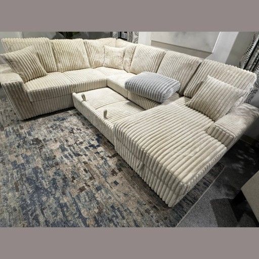 beige Jumbo corduroy storage chaise sectional sofa with pullout sleeper bed
