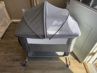 Anyask Baby Bedside Bassinet, 6 Height Adjustable Crib with Mosquito Net&Storage&Lockable Wheels for Infants, Light Grey