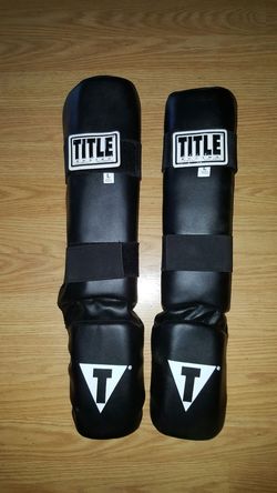 Shin pads...Title Brand size large..also covers feet!...Brand new!