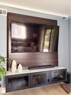 Wall TV panel with floating cabinet
